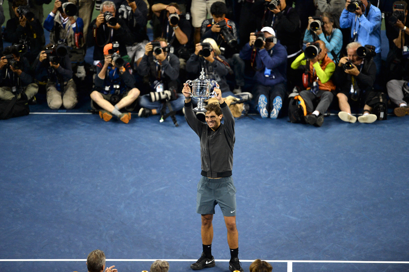 Rafael Nadal wins the 2013 US Open over top seed Novak Djokovic 6-2, 3-6, 6-4, 6-1 and holds up the winner's trophy.