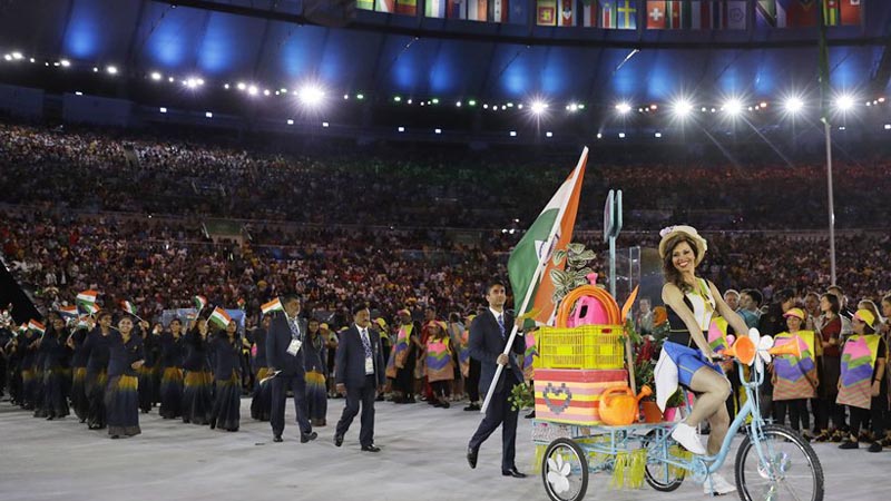 Abhinav Bindra carries the flag of India during the opening ceremony for the 2016 Summer Olympics in Rio de Janeiro, Brazil, Friday, Aug. 5, 2016. (AP Photo/David J. Phillip)